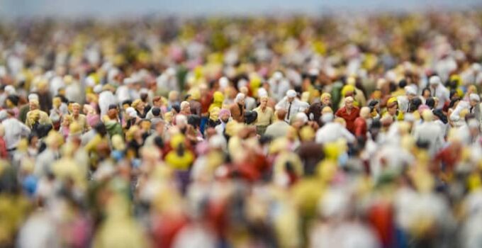Malthusians vs Cornucopians: A Contemporary Perspective on Population Growth