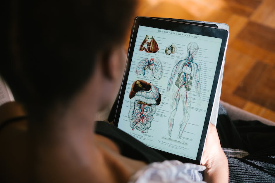 Decoding Peer Reviewed Articles: A Comprehensive Guide 4 An image depicting a person studying a peer-reviewed article with focus and determination.
